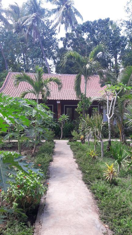 Enak Bungalow Amed Esterno foto
