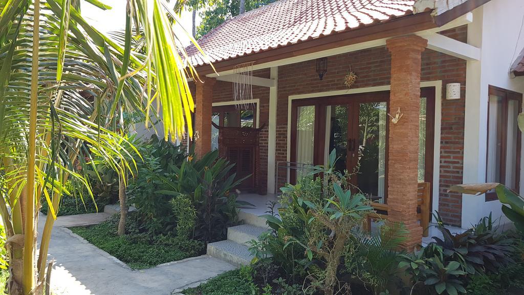 Enak Bungalow Amed Esterno foto